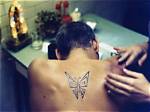 Does George Clooney Have a Butterfly Tattoo